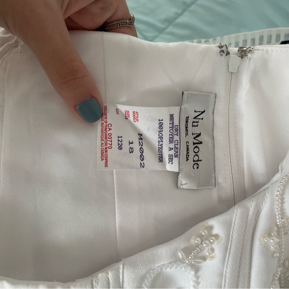 Size 18 white wedding dress. Comes with the train and petticoat. $1200 OBO - Picture 7 of 11